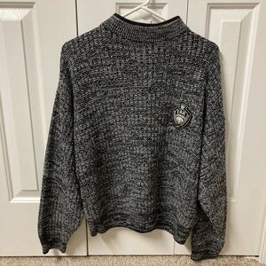 Black and white mock neck knit sweater
